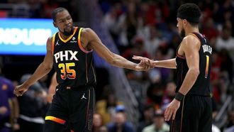 Booker's 52 Points Lead Suns To Win