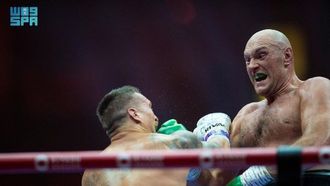 أوزيك يفوز بلقب الوزن الثقيل