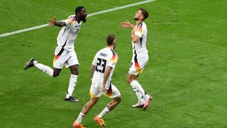 Germany Tops Group A With Late Goal