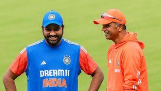 Sharma Appeals To Dravid To Stay