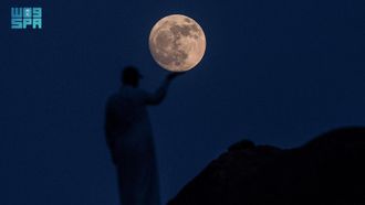 Blue Supermoon Dazzles Observers