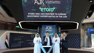 شراكة بين eToro وADX لتحقيق النمو الاستثماري