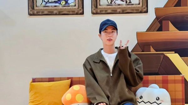 Jin Celebrates Discharge with Fan Hugs