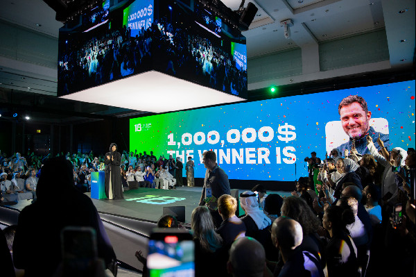 Simon Squibb Receives One Billion Award from Latifa